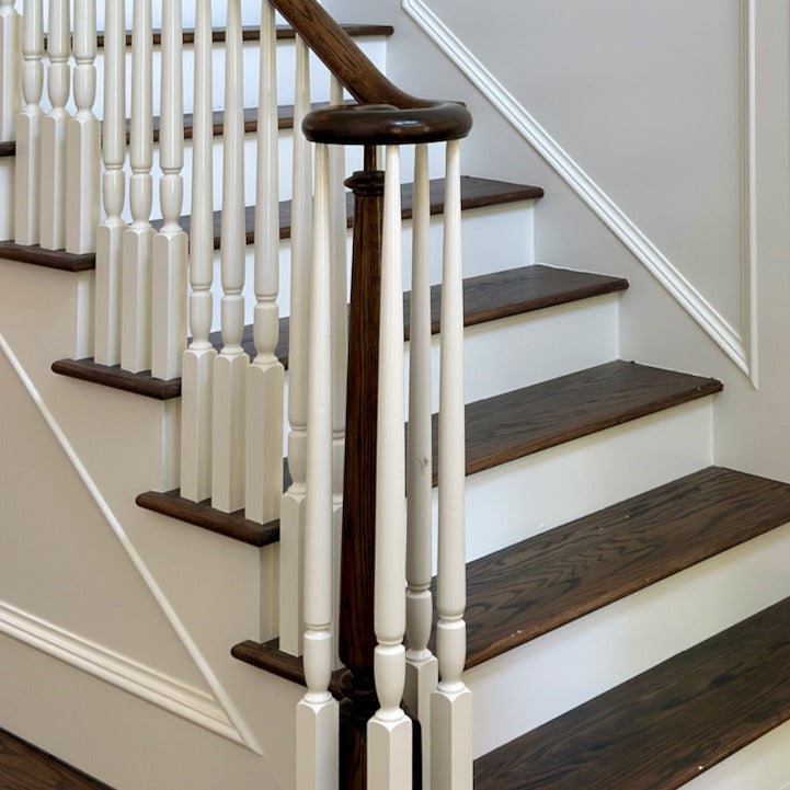 Custom pin top stairwell with hardwood treads in an Atlanta GA home by Reviving Dawn