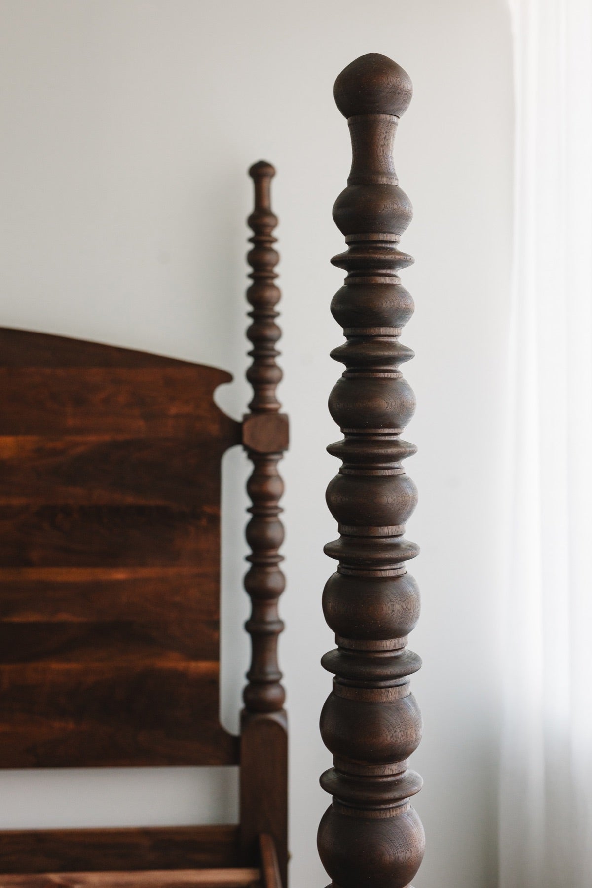 Close up of a turned black walnut post