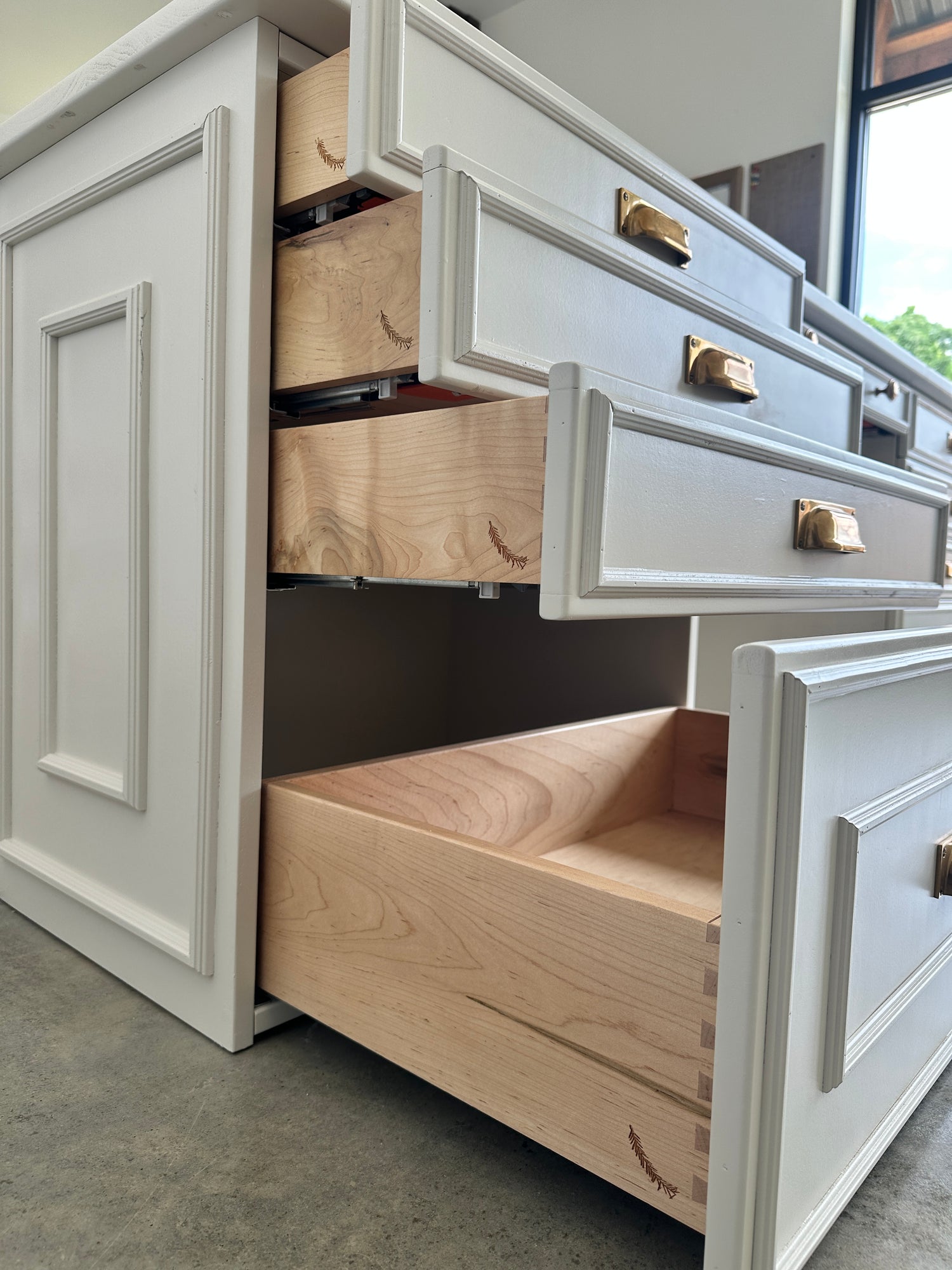 Hand-cut dovetailed drawer joints in solid hardwood — furniture-grade construction at Reviving Dawn
